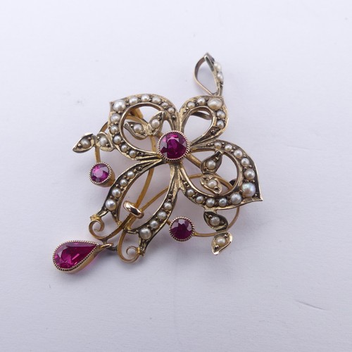 236 - An Edwardian pink sapphire and seed pearl Pendant / Brooch, of Art Nouveau design with three millegr... 