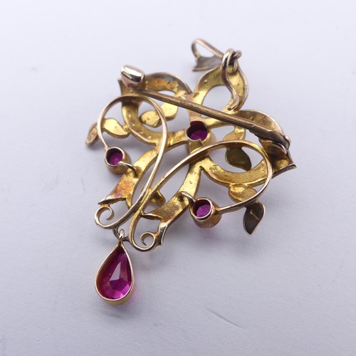 236 - An Edwardian pink sapphire and seed pearl Pendant / Brooch, of Art Nouveau design with three millegr... 