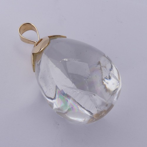 242 - A large pear shaped rock crstal Pendant, mounted in 9ct yellow gold, marked 375 and initialled 'M', ... 