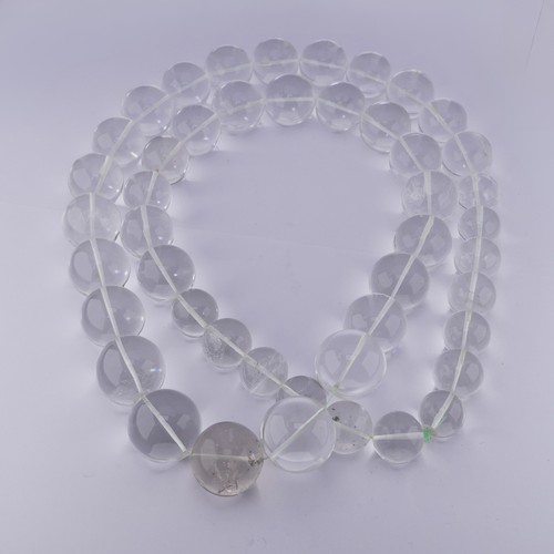 315 - A large graduated rock crystal Necklace, the forty-six circular beads ranging from 17mm - 25mm, appr... 