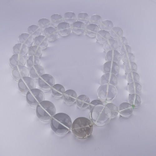 315 - A large graduated rock crystal Necklace, the forty-six circular beads ranging from 17mm - 25mm, appr... 