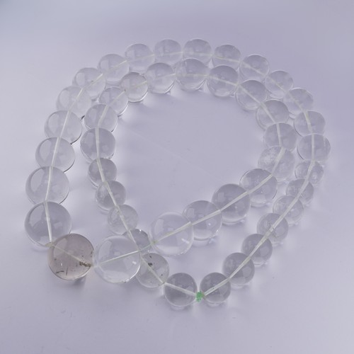 315 - A large graduated rock crystal Necklace, the forty-six circular beads ranging from 17mm - 25mm, appr... 