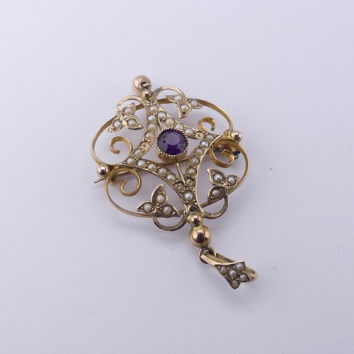 240 - An Edwardian garnet and seed pearl Pendant, in the Art Nouveau style, mounted in 9ct gold,4.8cm long... 