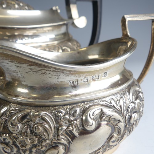 22 - A late Victorian silver three piece Tea Set, probably by Charles Horner, hallmarked Birmingham 1900,... 