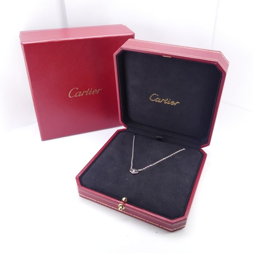 218 - Cartier; An 18ct white gold 'C Heart of Cartier' Necklace, the stylised C heart with collet set bril... 