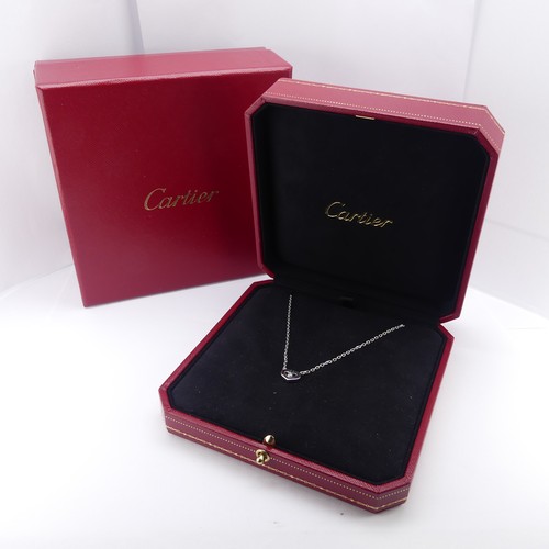 218 - Cartier; An 18ct white gold 'C Heart of Cartier' Necklace, the stylised C heart with collet set bril... 