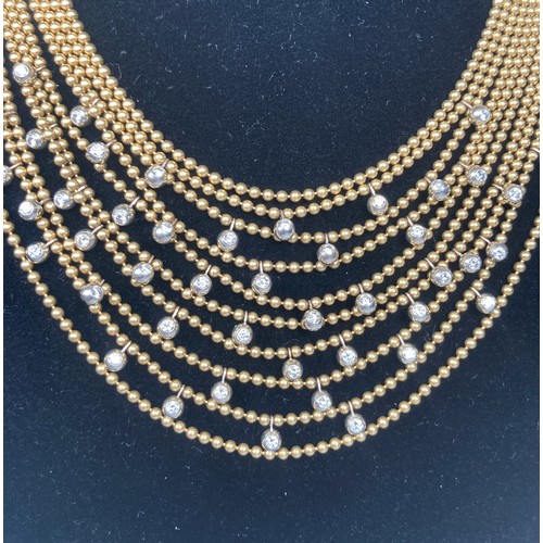 246 - Cartier; A stunning 18ct yellow gold and diamond multi-strand Necklace, from the 'Draperie de décoll... 