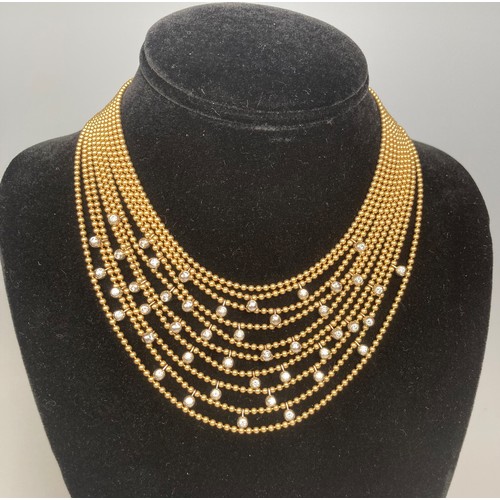 246 - Cartier; A stunning 18ct yellow gold and diamond multi-strand Necklace, from the 'Draperie de décoll... 