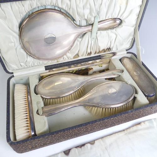 103 - A cased George V silver backed Dressing Table Set, by Daniel Manufacturing Company, hallmarked Birmi... 