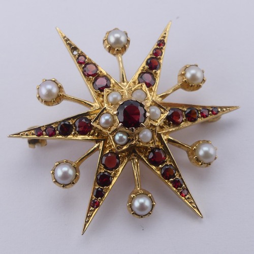 318 - A garnet and cultured pearl star Brooch, in the Victorian style, all mounted in 9ct yellow gold, 38m... 