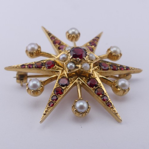 318 - A garnet and cultured pearl star Brooch, in the Victorian style, all mounted in 9ct yellow gold, 38m... 