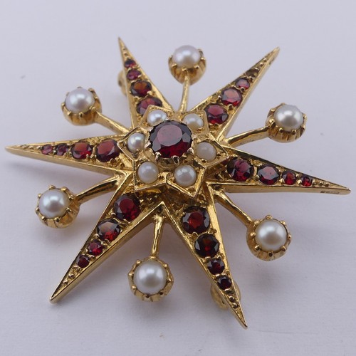 318 - A garnet and cultured pearl star Brooch, in the Victorian style, all mounted in 9ct yellow gold, 38m... 