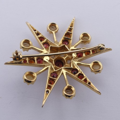 318 - A garnet and cultured pearl star Brooch, in the Victorian style, all mounted in 9ct yellow gold, 38m... 