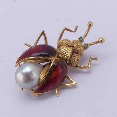 An 18ct yellow gold 'Bug' Brooch, with cultured pearl abdomen, red enamelled wings and emerald eyes, with Birmingham import marks for 1971, 3.5cm long, approx. total weight 8.9g.