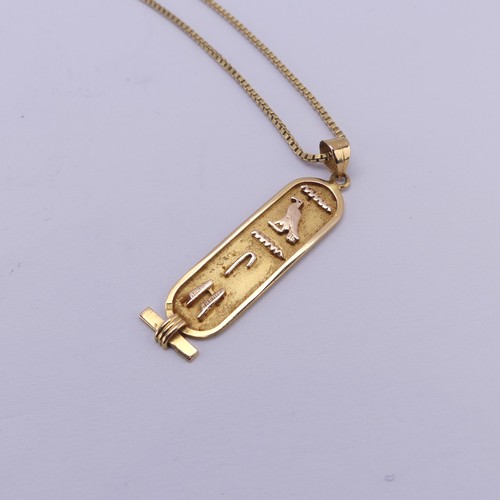 249 - A 18ct yellow gold Egyptian Hieroglyph Pendant, 4.3cm long, on an 18ct gold box link chain, 55cm lon... 