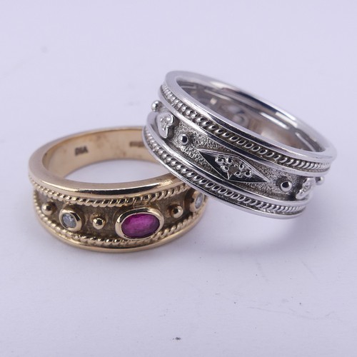 154 - A 9ct yellow gold Band, collet set with a central ruby and two small diamonds, the front 7.8mm wide,... 