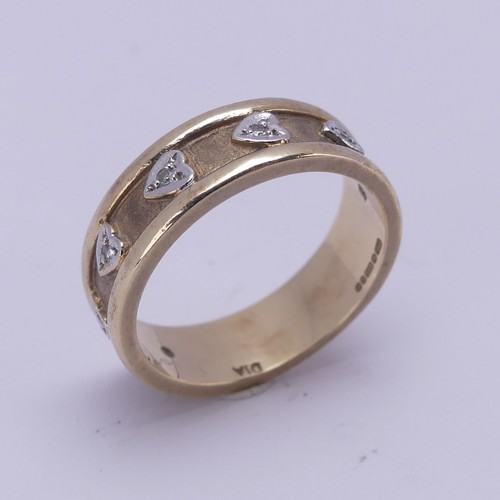 156 - A 9ct yellow gold Band, the textured centre with seven applied white gold hearts set small diamond p... 