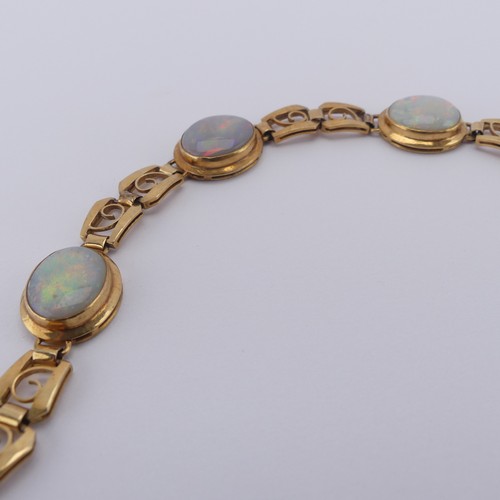 284 - An 18ct yellow gold and opal Bracelet, with five oval cabochon opals each approx. 12mm long, collet ... 