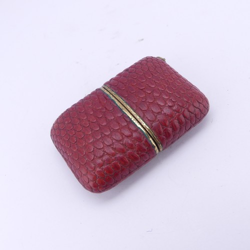 130 - A vintage Komos Purse Watch, with 17-jewels crown wind movement, red leather case, 5.5cm long closed... 