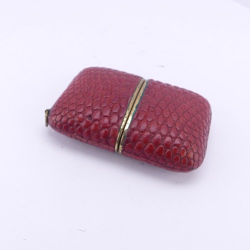 130 - A vintage Komos Purse Watch, with 17-jewels crown wind movement, red leather case, 5.5cm long closed... 