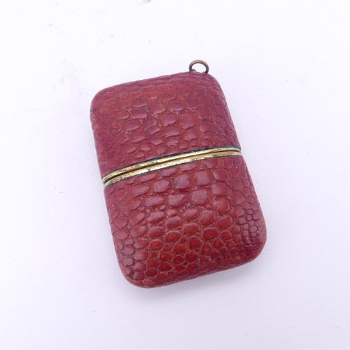 130 - A vintage Komos Purse Watch, with 17-jewels crown wind movement, red leather case, 5.5cm long closed... 