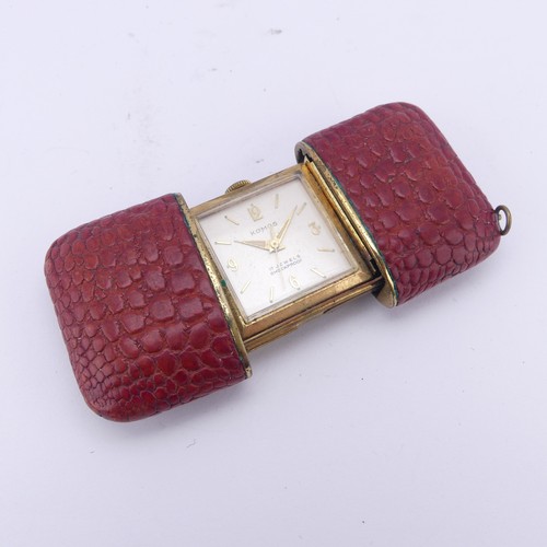 130 - A vintage Komos Purse Watch, with 17-jewels crown wind movement, red leather case, 5.5cm long closed... 