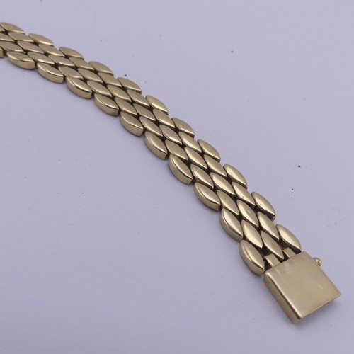 285 - A 14ct yellow gold Bracelet, with flexible navette shaped brick links, marked on the box snap 14k an... 