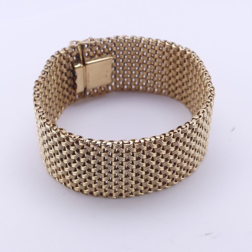 286 - A 9ct yellow gold woven mesh Bracelet, hallmarked Birmingham 1990, 25.5mm wide, 18cm long, 55g.... 