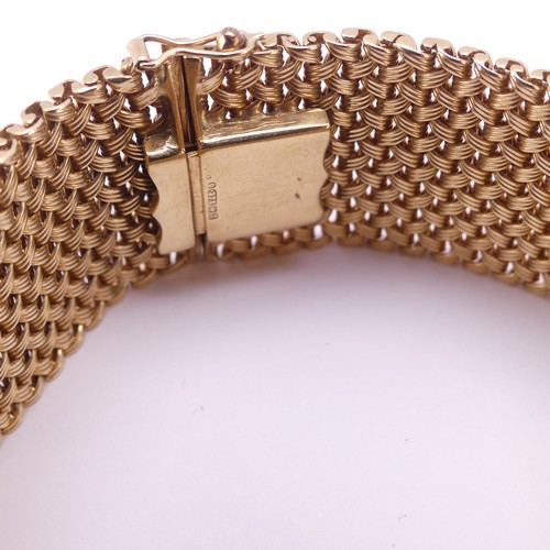 286 - A 9ct yellow gold woven mesh Bracelet, hallmarked Birmingham 1990, 25.5mm wide, 18cm long, 55g.... 