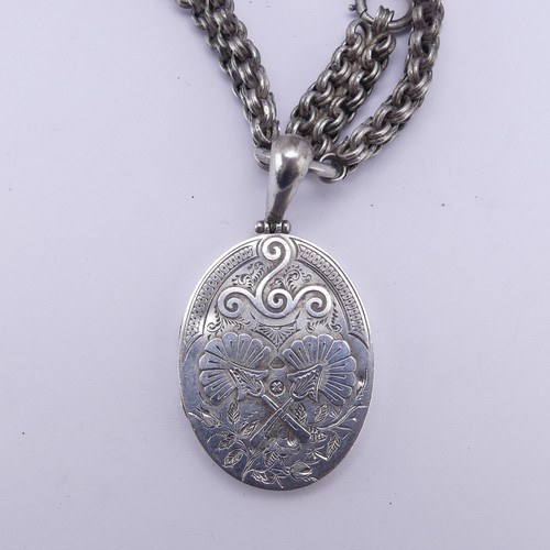 253 - A Victorian silver Locket and Chain, in the Aesthetic style, the locket hallmarked Birmingham 1882, ... 