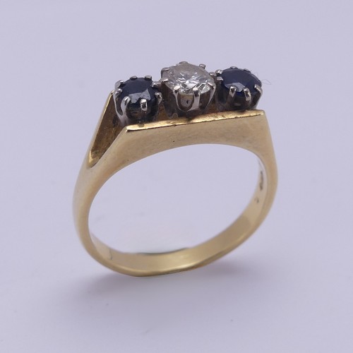 161 - A three stone sapphire and diamond Ring, the brilliant cut central diamond approx. 0.3ct, with a cir... 