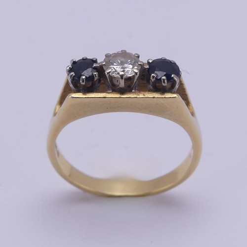 161 - A three stone sapphire and diamond Ring, the brilliant cut central diamond approx. 0.3ct, with a cir... 