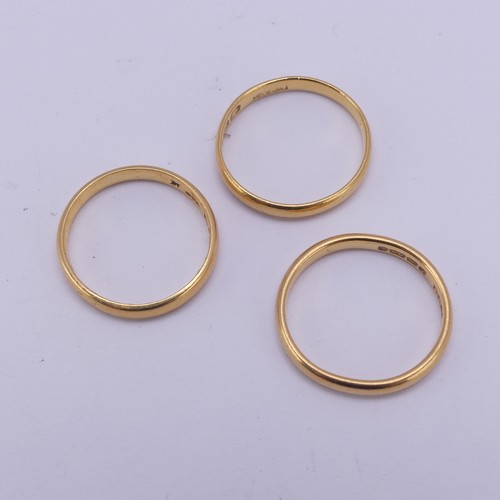 163 - Three narrow 22ct yellow gold Bands, two Size L½, the other M, approx. total weight 8.4g (3)... 