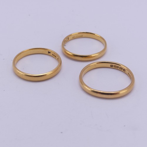 163 - Three narrow 22ct yellow gold Bands, two Size L½, the other M, approx. total weight 8.4g (3)... 