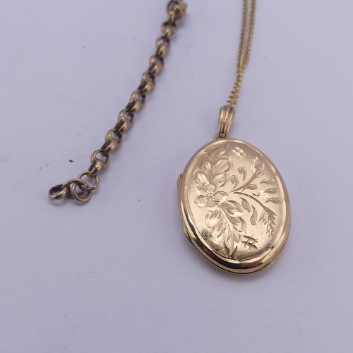 355 - A 9ct yellow gold oval hinged Locket, the front with foliate decoration, 2.6cm long, on a 9ct gold f... 