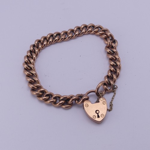 287 - A 9ct rose gold curb link Bracelet, with 9ct gold padlock clasp, 13.3g.