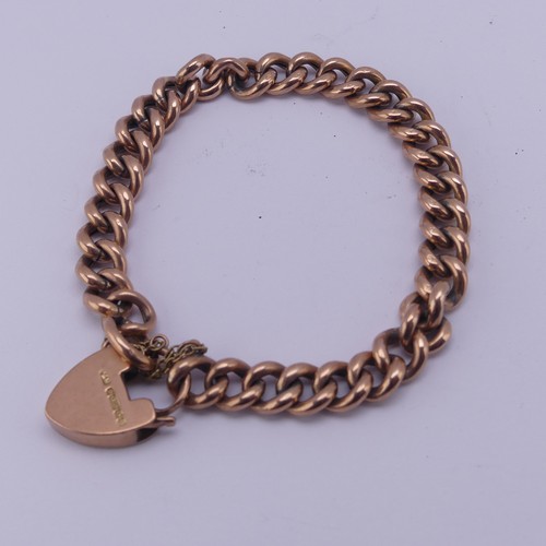 287 - A 9ct rose gold curb link Bracelet, with 9ct gold padlock clasp, 13.3g.