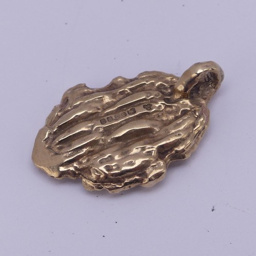 256 - A 9ct yellow gold 'Nugget' Ingot Pendant, hallmarked London 1977, 2.8cm long, 8.4g.