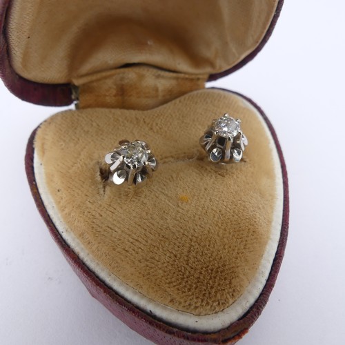 324 - A pair of diamond single stone stud Earrings, the brilliant cut stones each approx. 0.15ct, claw set... 