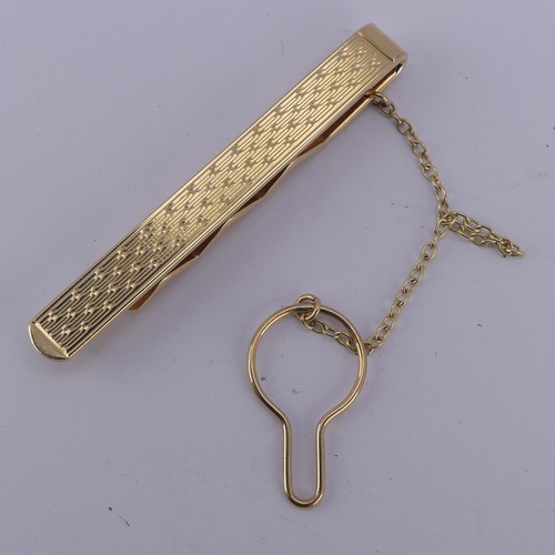 361 - A 9ct yellow gold Tie Pin, with engine turned decoration, 7.5g.