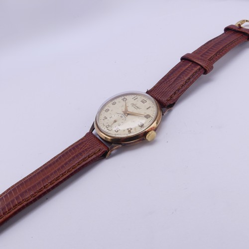 134 - A vintage 9ct gold Accurist Wristwatch, the champagne dial with gilt Arabic numerals and hands, subs... 