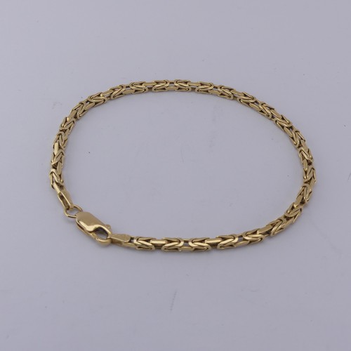 290 - An 18ct yellow gold Bracelet, the fancy links 2.6mm wide, total length 19.5cm, 10.3g.... 