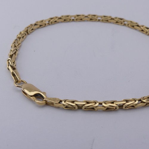 290 - An 18ct yellow gold Bracelet, the fancy links 2.6mm wide, total length 19.5cm, 10.3g.... 