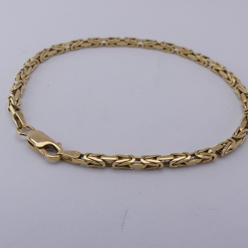 290 - An 18ct yellow gold Bracelet, the fancy links 2.6mm wide, total length 19.5cm, 10.3g.... 