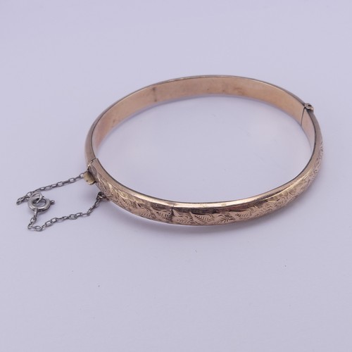 293 - A 9ct rose gold hollow hinged Bangle, as found, 7.5g.