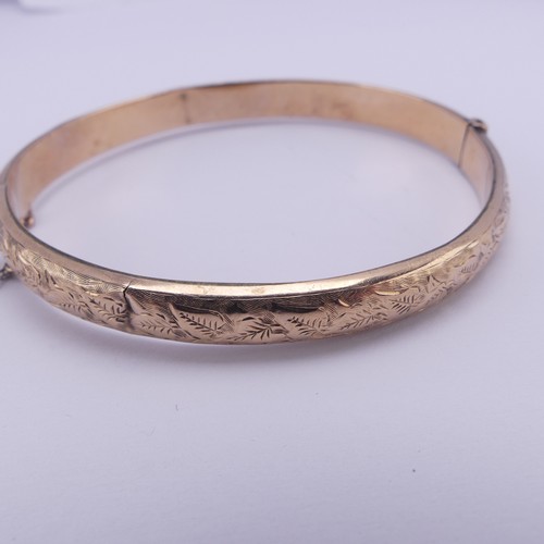 293 - A 9ct rose gold hollow hinged Bangle, as found, 7.5g.