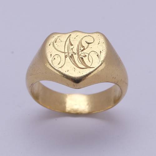 176 - An 18ct yellow gold Signet Ring, the shield shaped front engraved with initials, Size U, 13.8g.... 