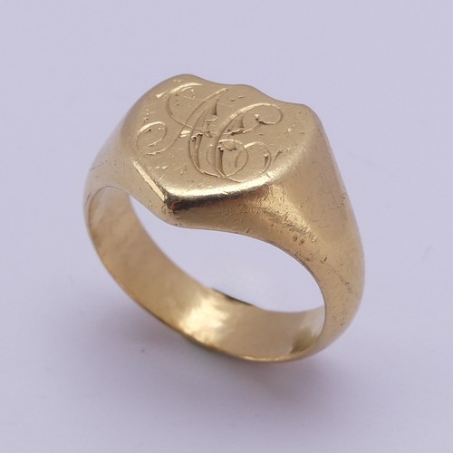 176 - An 18ct yellow gold Signet Ring, the shield shaped front engraved with initials, Size U, 13.8g.... 