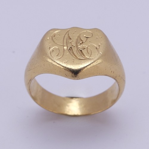 176 - An 18ct yellow gold Signet Ring, the shield shaped front engraved with initials, Size U, 13.8g.... 