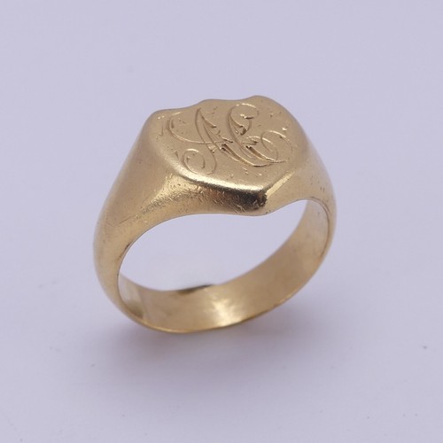 176 - An 18ct yellow gold Signet Ring, the shield shaped front engraved with initials, Size U, 13.8g.... 